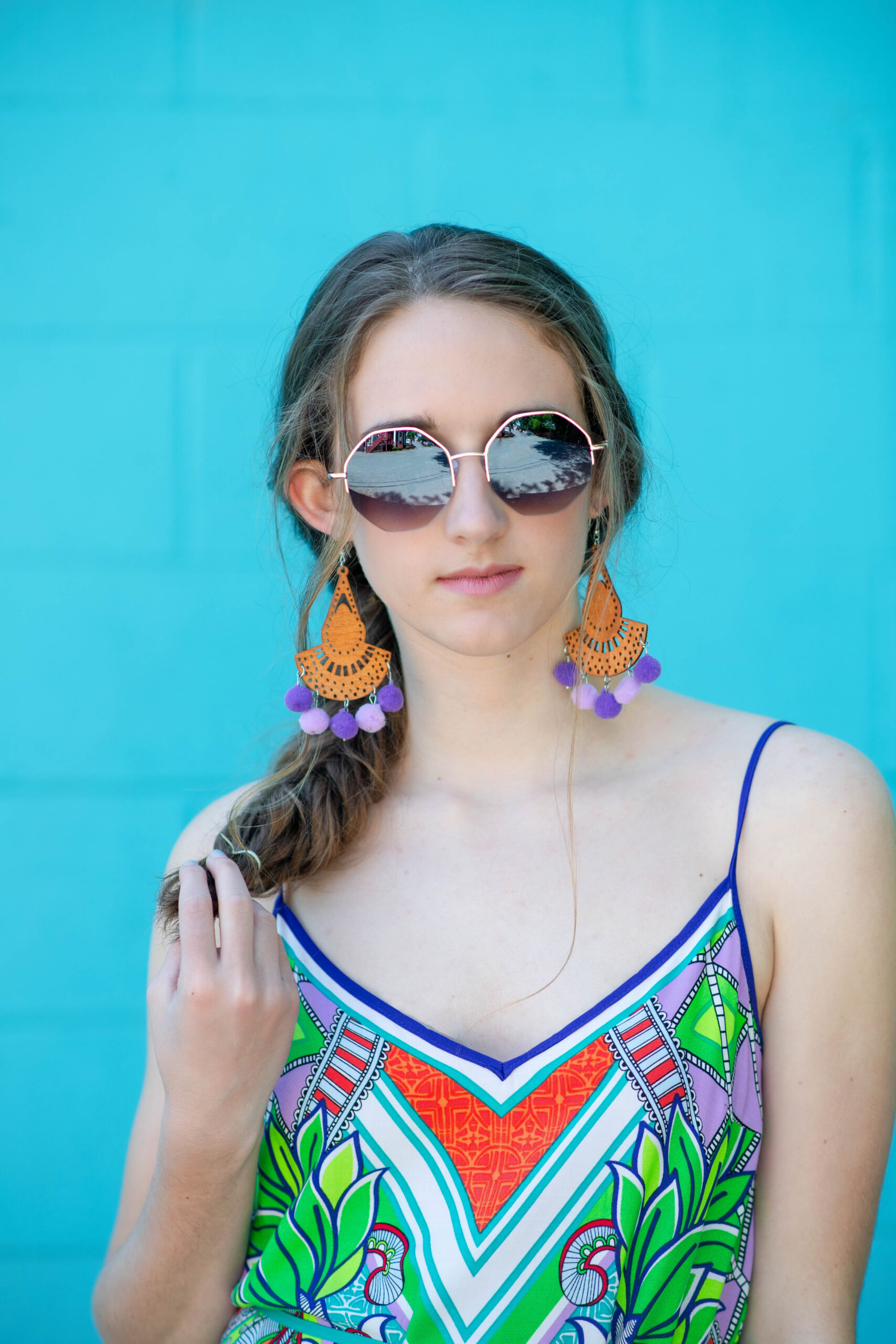senior portrait sunglasses fancy earrings